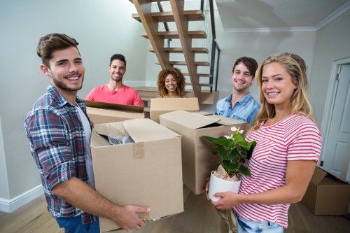 Customer moving a box safely with proper handling practices
