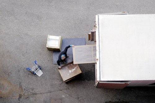 Removal team preparing furniture for a move in Gantshill