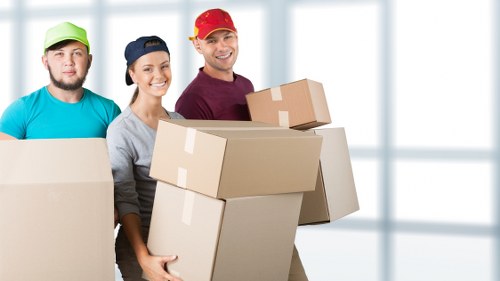 Stacked boxed goods inside a storage unit under service terms