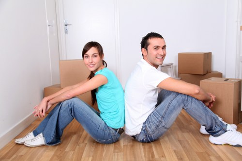Careful packing of household items for a flat relocation