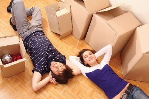 Movers carrying furniture safely during a Gantshill relocation